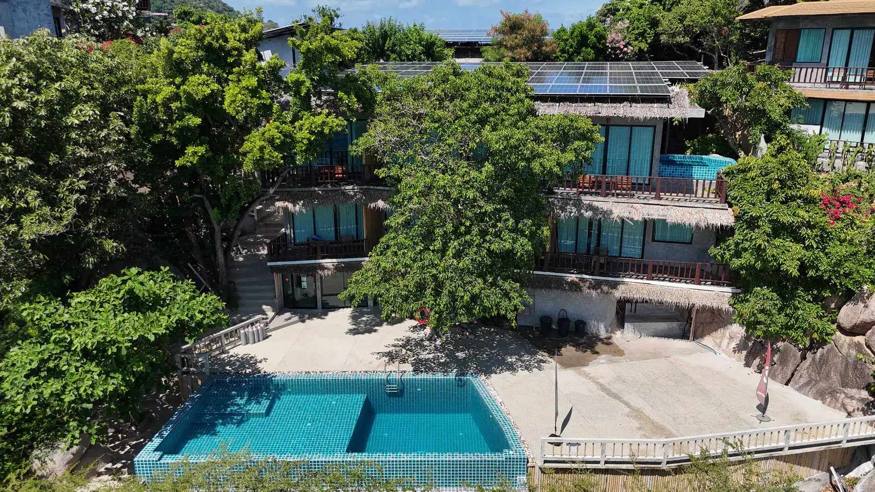A pool villa at the resort, among the trees